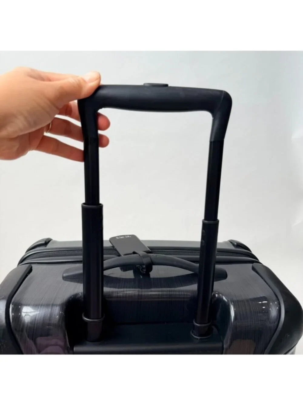 TUMI Compact Brief Rolling Carry-On Spinner Luggage Black/Gray